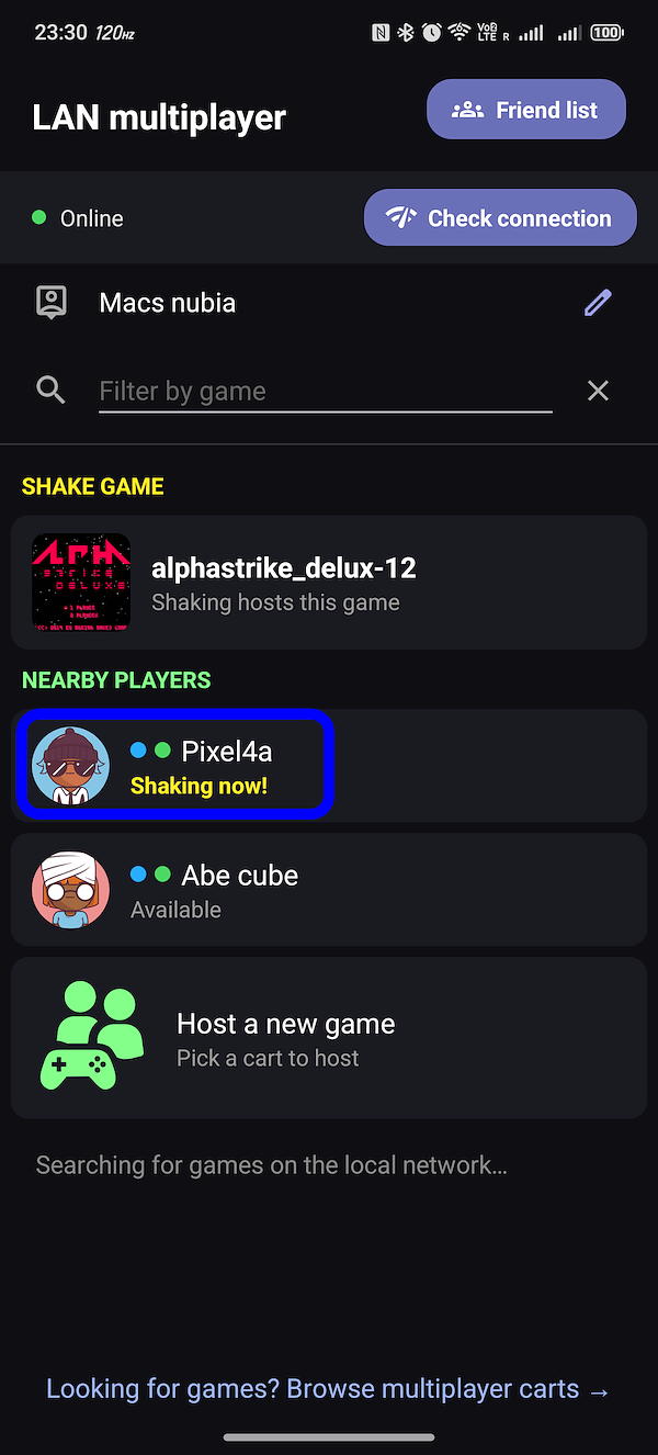 The lobby while shaking: the nearby player shows "Shaking now!" and the phones pair up
